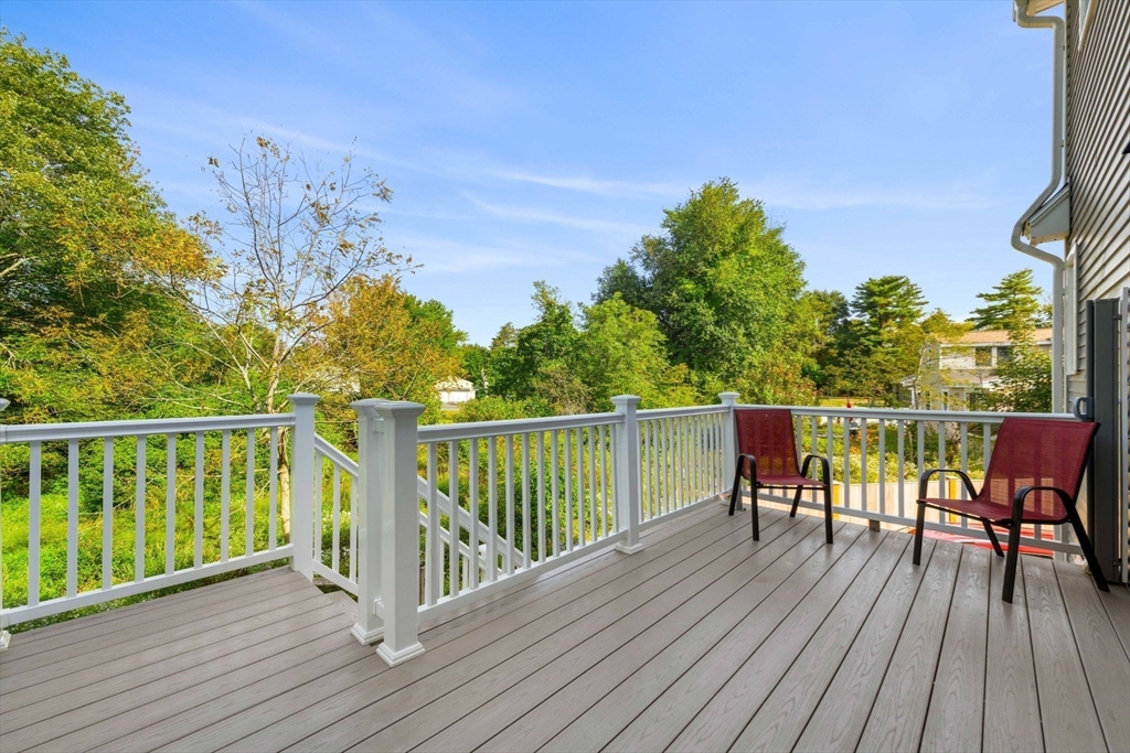 84 Ferry Road Salisbury, MA 01952 - Photo 35 of 42 a balcony with wooden floor and fence