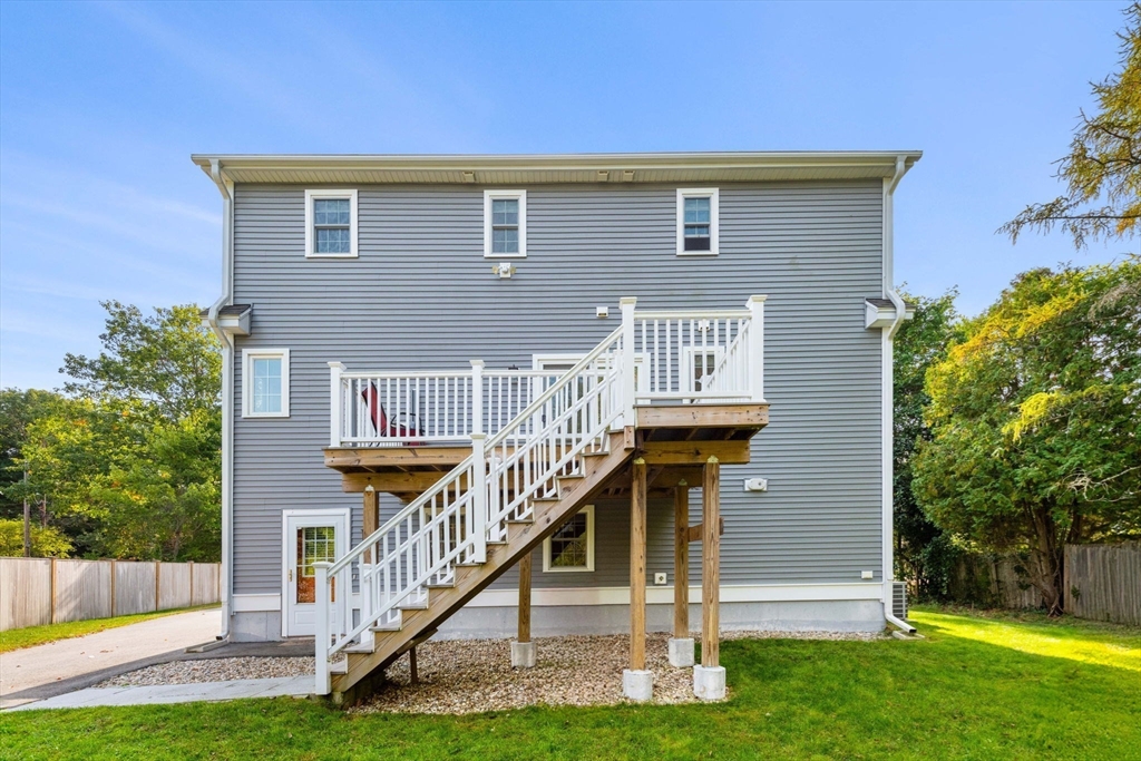 84 Ferry Road Salisbury, MA 01952 - Photo 37 of 42 a front view of a house with a yard
