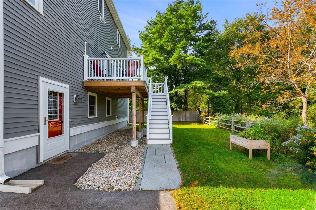 84 Ferry Road Salisbury, MA 01952 - Photo 38 of 42 a front view of a house with a garden