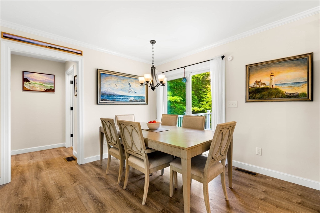 84 Ferry Road Salisbury, MA 01952 - Photo 9 of 42 a view of a dining room with furniture window and wooden floor