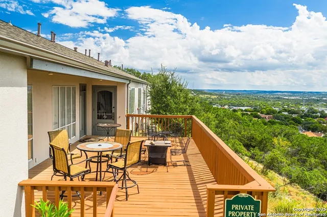 a view of sitting area with furniture and wooden floor