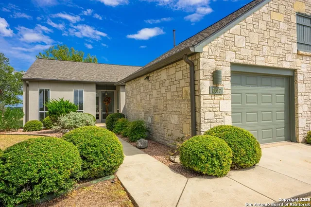 a view of a back yard of the house