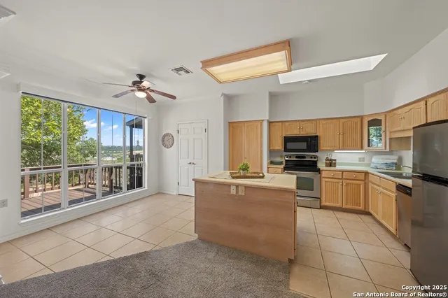a large kitchen with cabinets