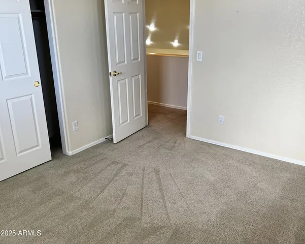 a view of a storage & utility room with a sink