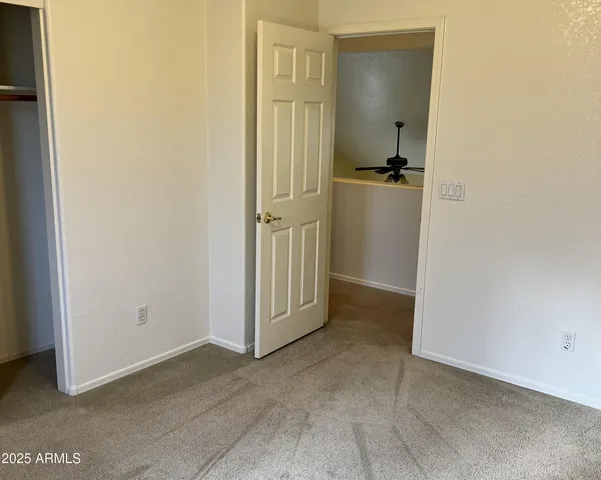 a view of a room that has a window in it