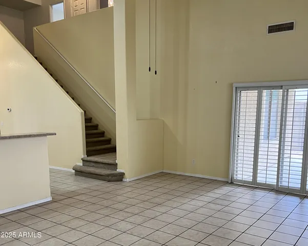 a view of entryway with stairs