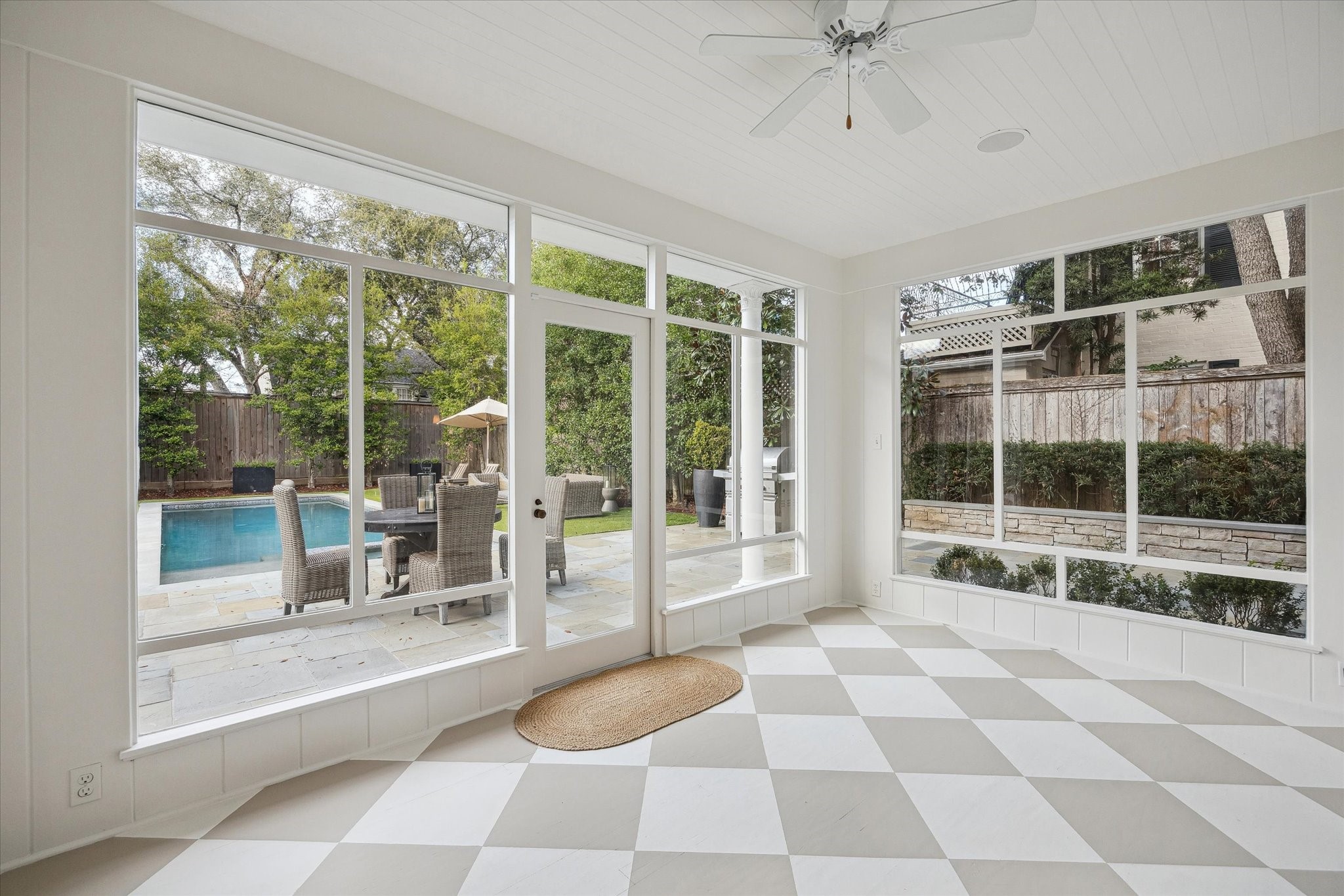 2440 Inwood Drive Houston, TX 77019 - Photo 12 of 25 a room with a large window and a yard