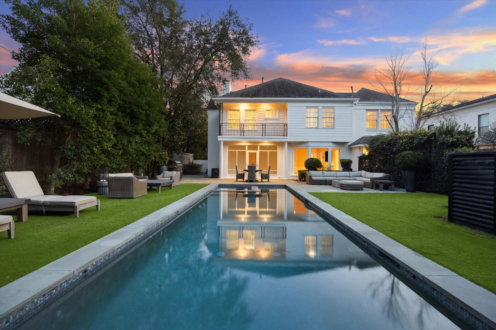 2440 Inwood Drive Houston, TX 77019 - Photo 24 of 25 a view of a house with a swimming pool