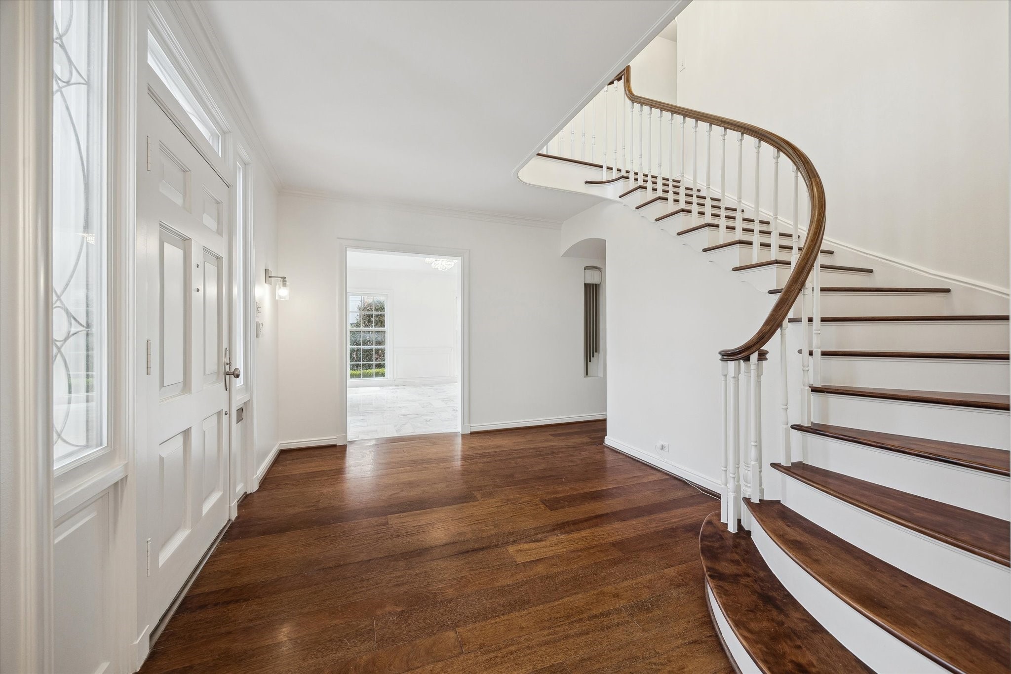 2440 Inwood Drive Houston, TX 77019 - Photo 4 of 25 a view of an entryway with wooden floor