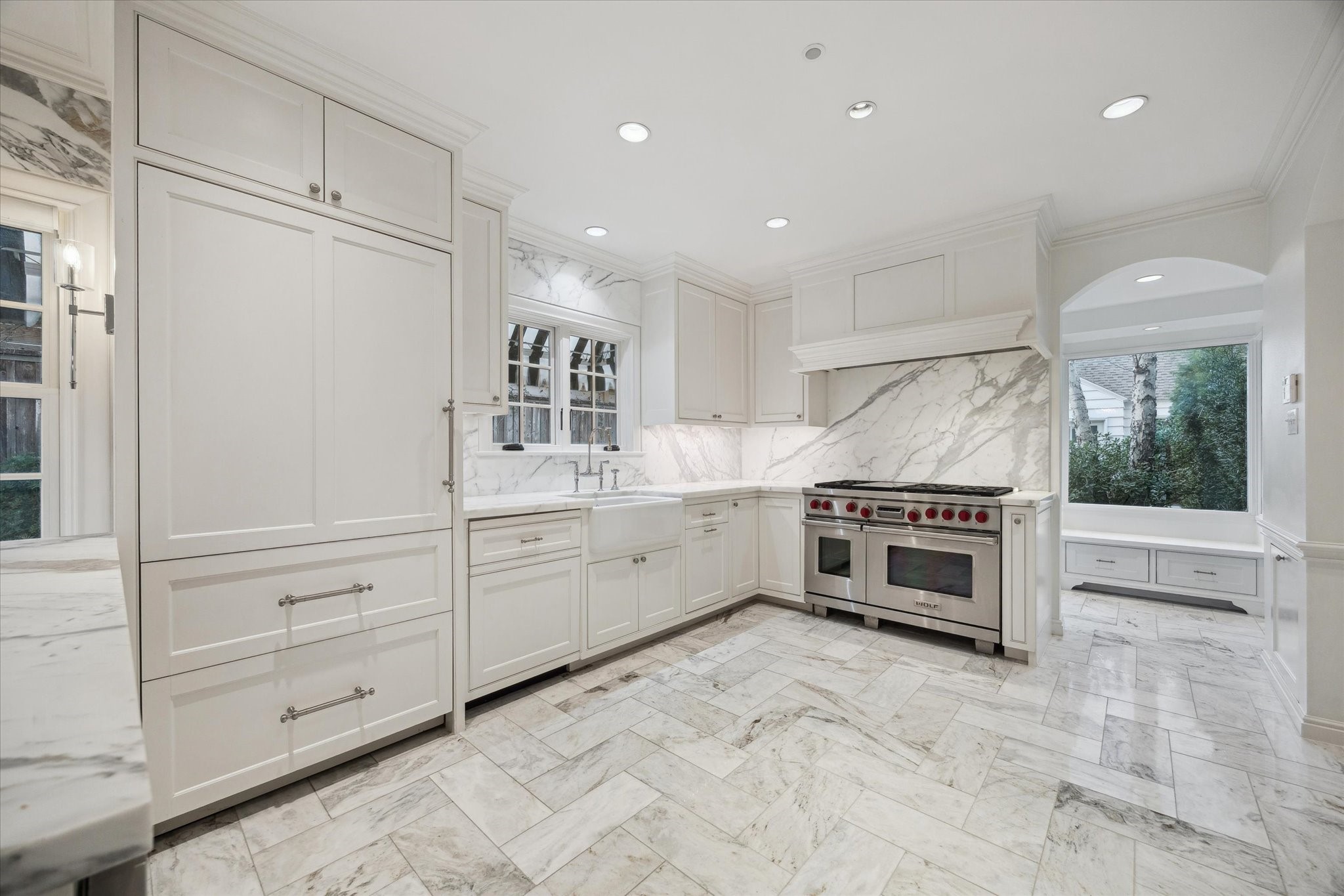 2440 Inwood Drive Houston, TX 77019 - Photo 7 of 25 a kitchen with stainless steel appliances a stove and a refrigerator
