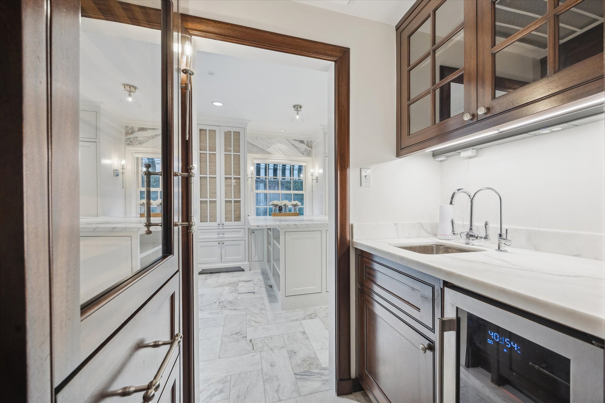 2440 Inwood Drive Houston, TX 77019 - Photo 9 of 25 a kitchen with stainless steel appliances granite countertop a sink and a refrigerator