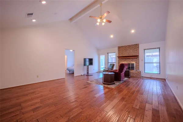 a kitchen with stainless steel appliances granite countertop a sink a stove and cabinets