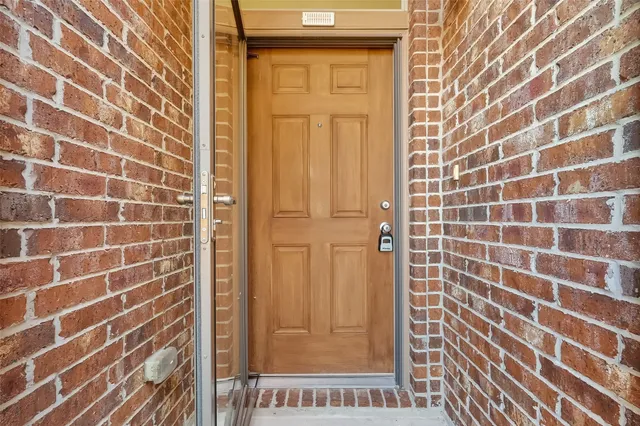 a bathroom with a shower and a sink