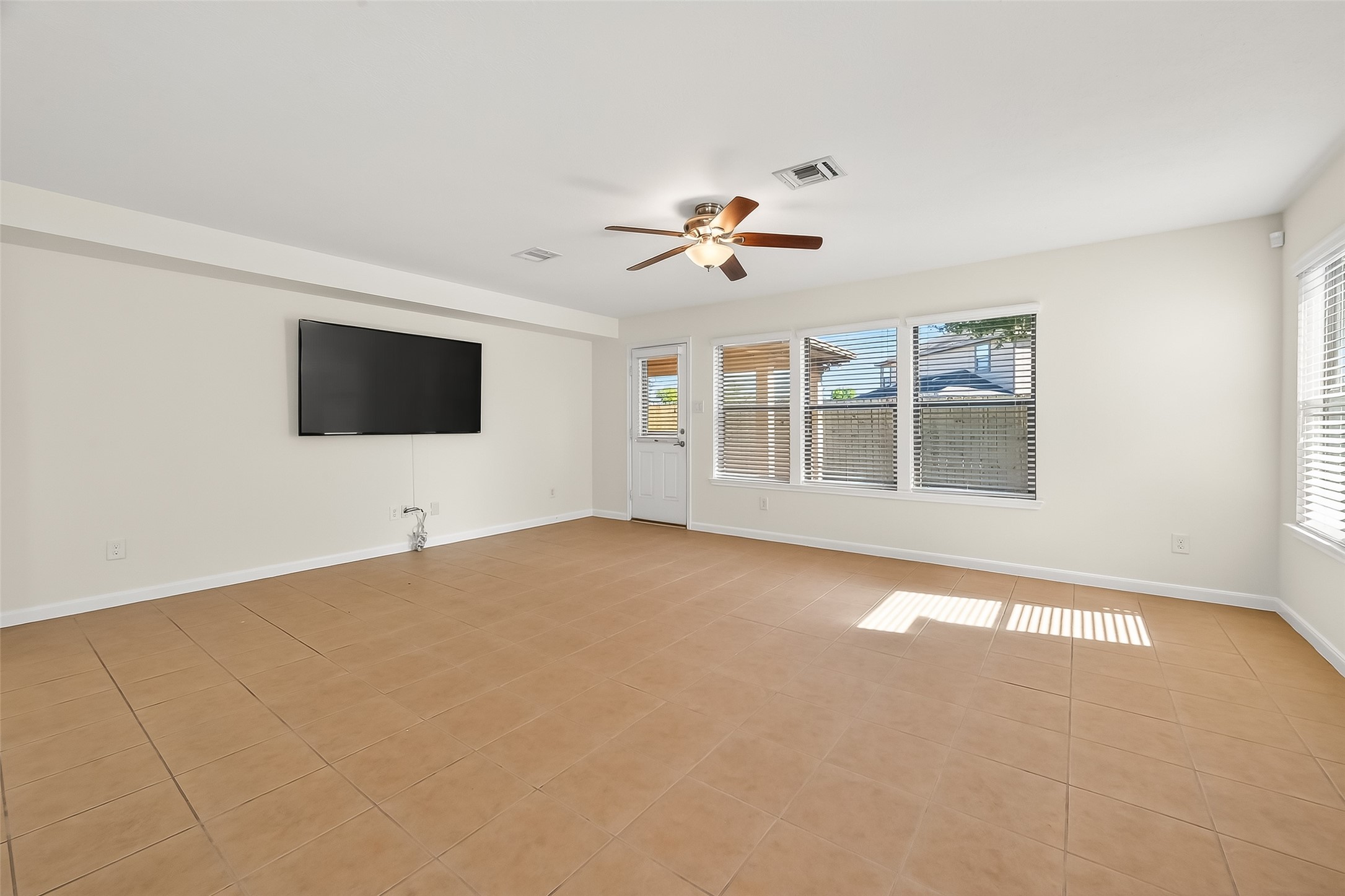 6722 Path Way Court Katy, TX 77449 - Photo 5 of 33 Interior just painted! Large living space with plenty of natural light