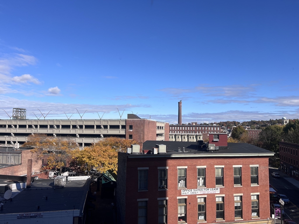 16 Merrimack Street, Unit 4A Lowell, MA 01852 - Photo 20 of 24 a view of a city with ocean