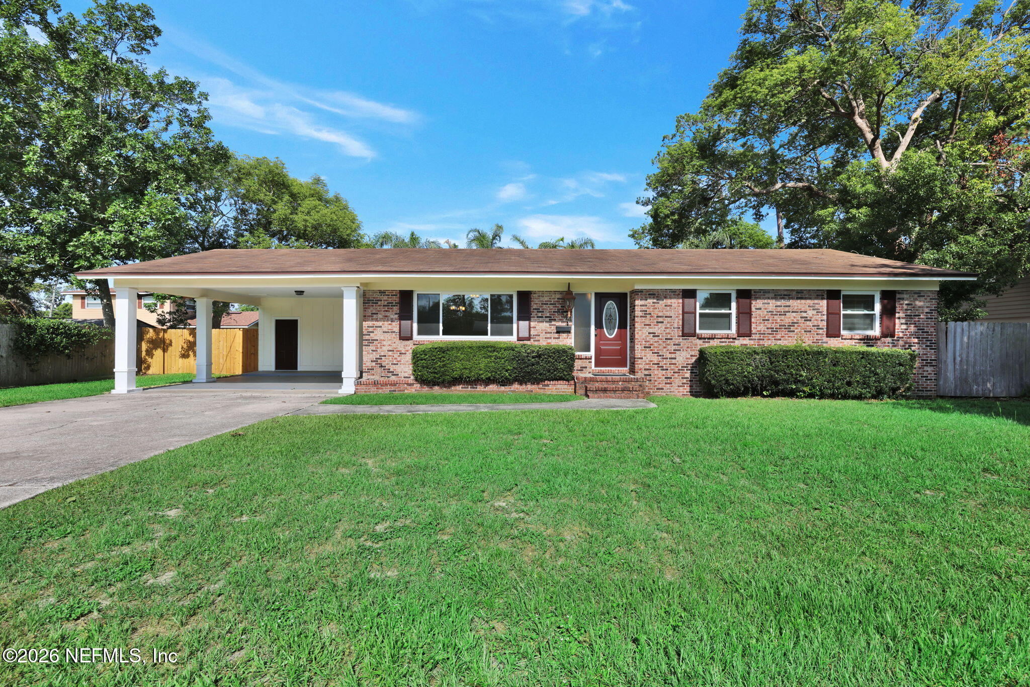 8544 Sanchez Road Jacksonville, FL 32217 - Photo 2 of 46 a view of a house with a backyard