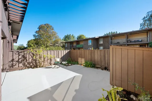 a backyard of a house with lots of green space