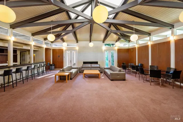 a view of a large room next to a large window