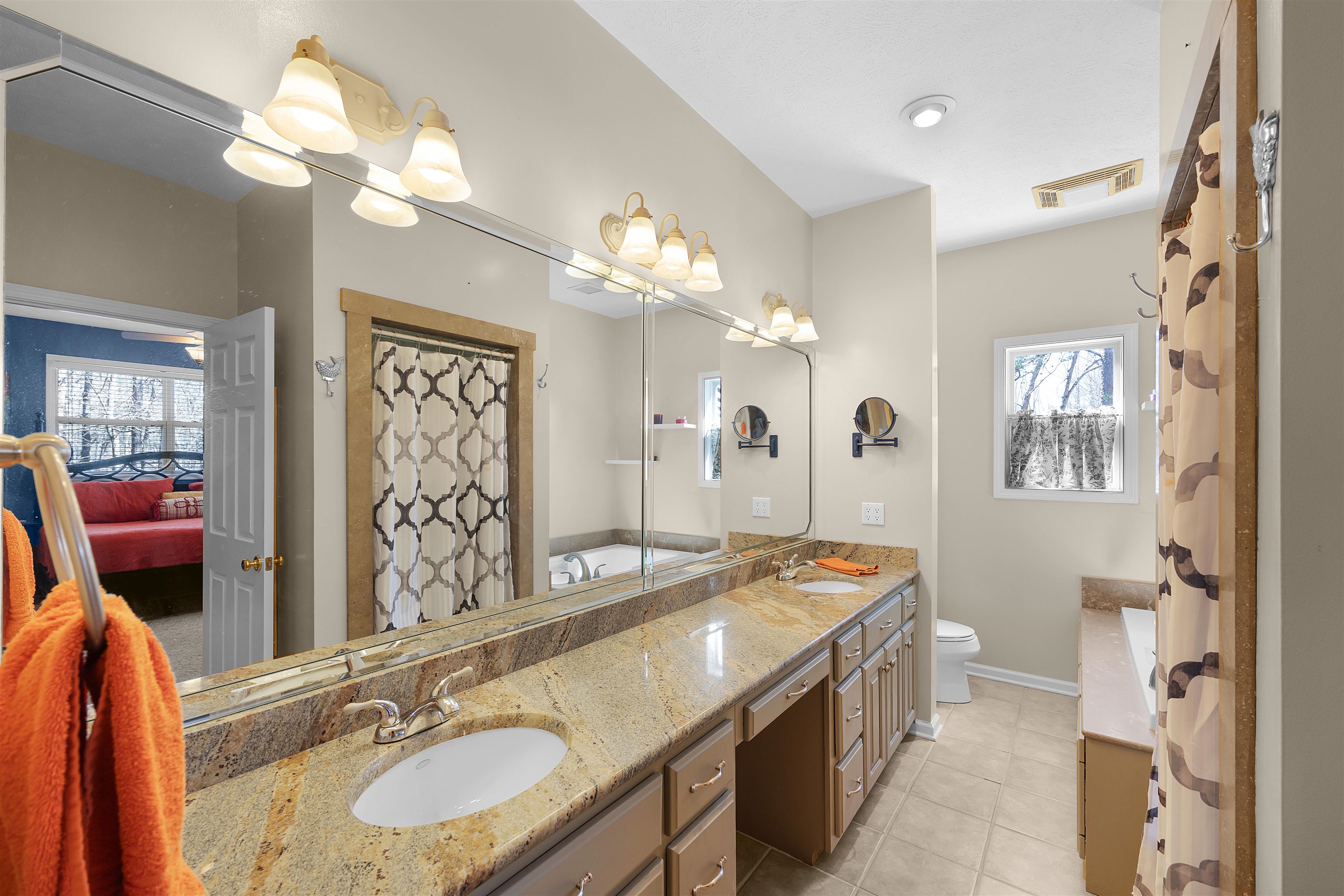 110 Falling Leaf Lane Counce, TN 38326 - Photo 15 of 31 a bathroom with a sink double vanity granite and a mirror