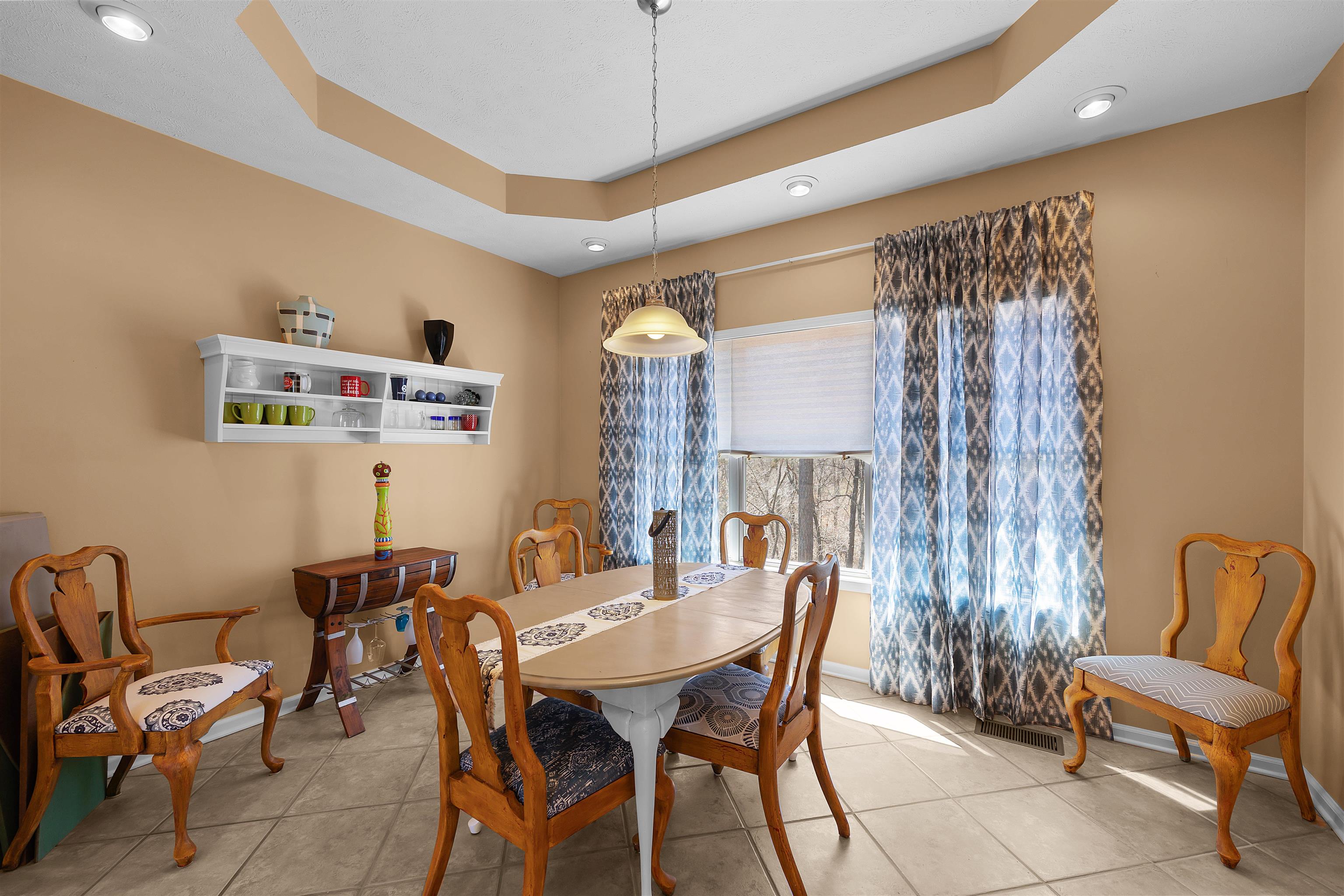 110 Falling Leaf Lane Counce, TN 38326 - Photo 10 of 31 a view of a dining room with furniture and a chandelier