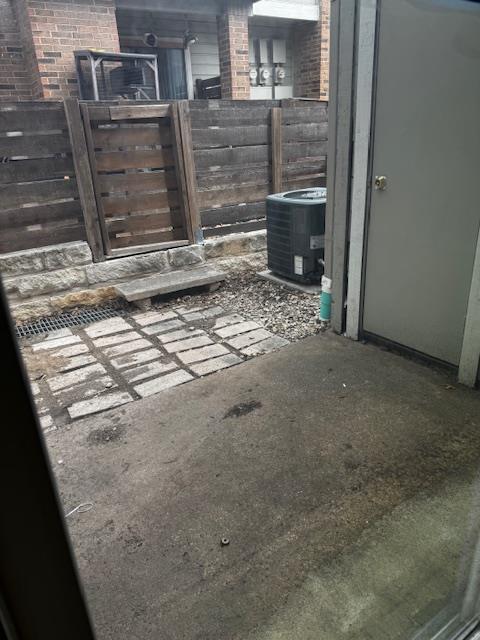 2018 West Rundberg Lane, Unit 6C Austin, TX 78758 - Photo 29 of 29 View of patio with enclosed storage area
