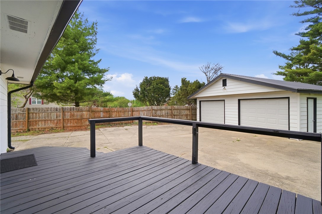 3991 Benner Road Miamisburg, OH 45342 - Photo 39 of 44 This spacious backyard features a durable deck and a detached garage.