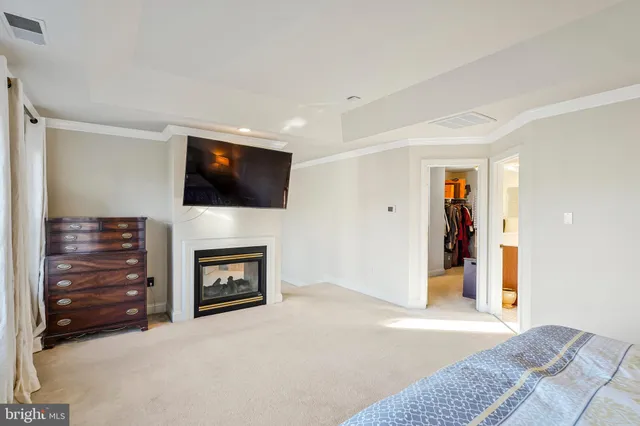 a bathroom with bathtub and window