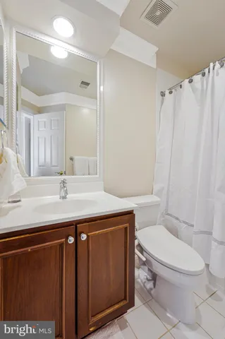 a bedroom with a bed and a cabinets