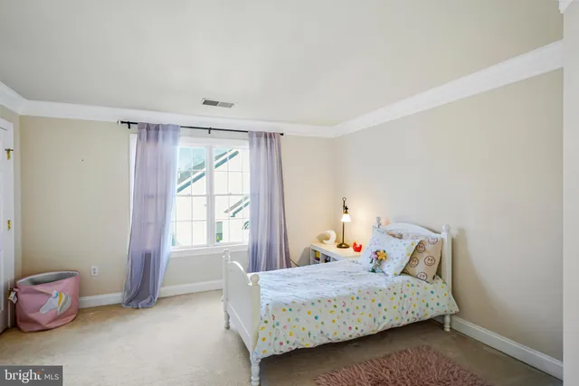 a utility room with sink dryer and washer