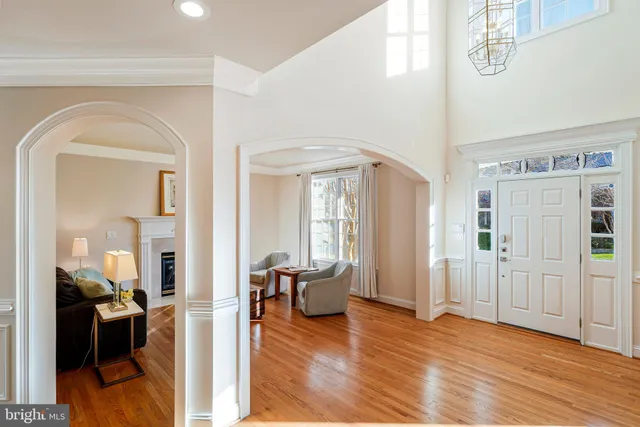 a view of livingroom with hardwood floor and furniture