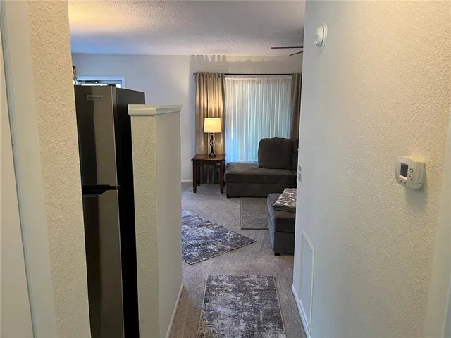 a bathroom with a sink toilet and mirror