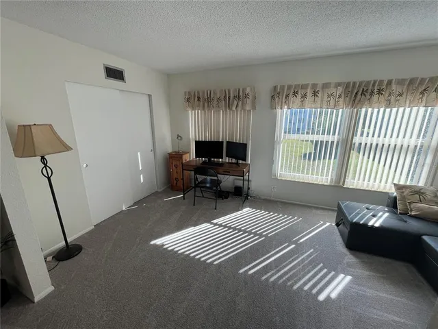 a view of a lake with a mountain in the background