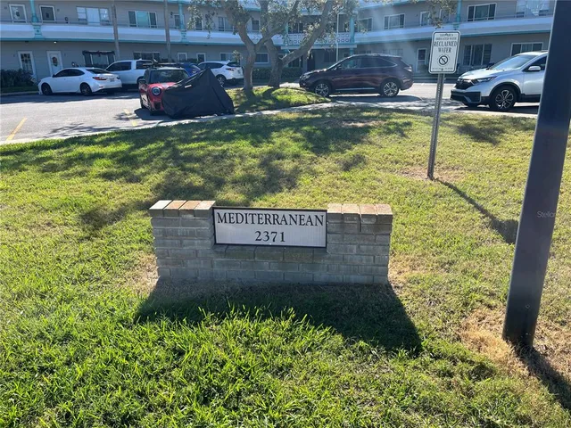 a view of swimming pool with a yard