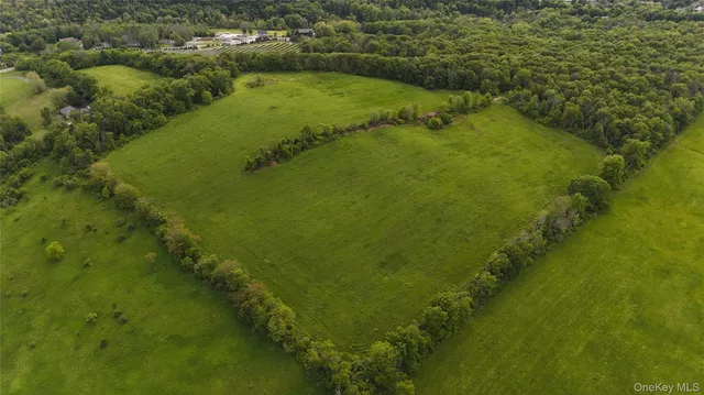 a view of a water with a yard