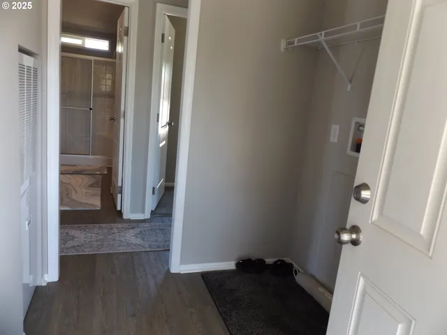 a view of entryway with wooden floor