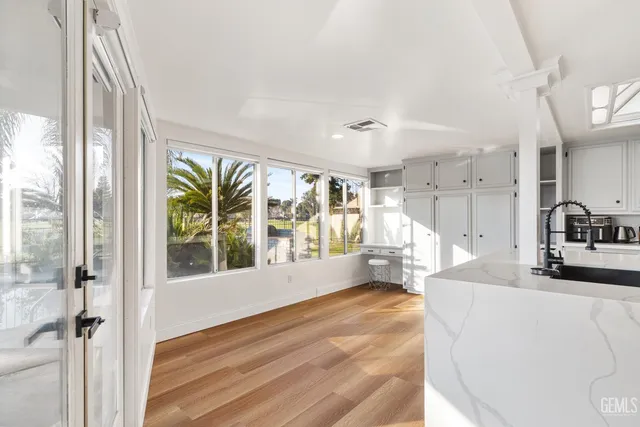 a large living room with a large window