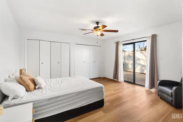 a bedroom with a bed and a couch