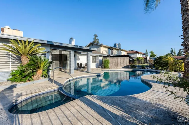 a view of a house with swimming pool