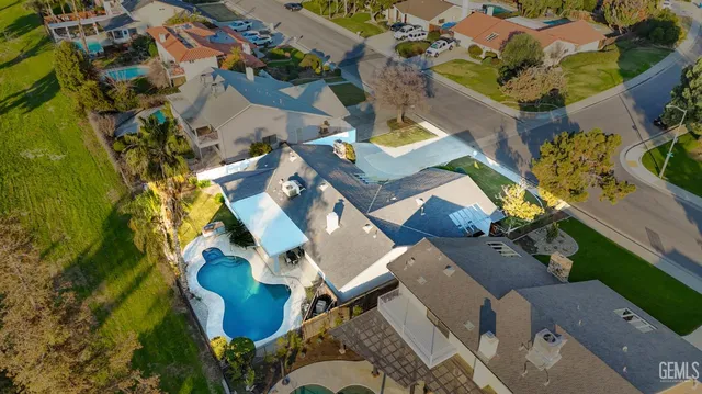 an aerial view of a house with outdoor space