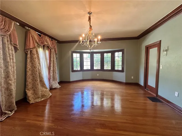 a view of livingroom with hardwood floor and window