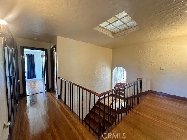 a view of entryway with wooden floor