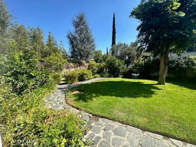 a view of a golf course with a fountain