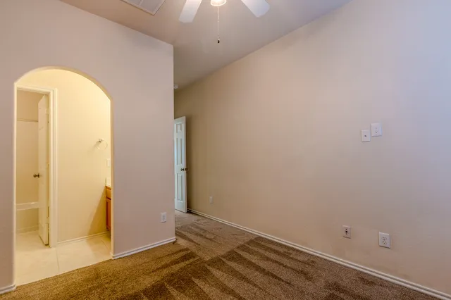 a bathroom with a sink a mirror and shower