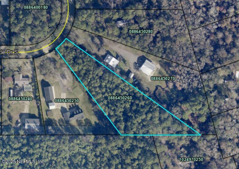 282 Circle Drive East St. Augustine, FL 32084 - Photo 2 of 8 a view of entryway with wooden stairs