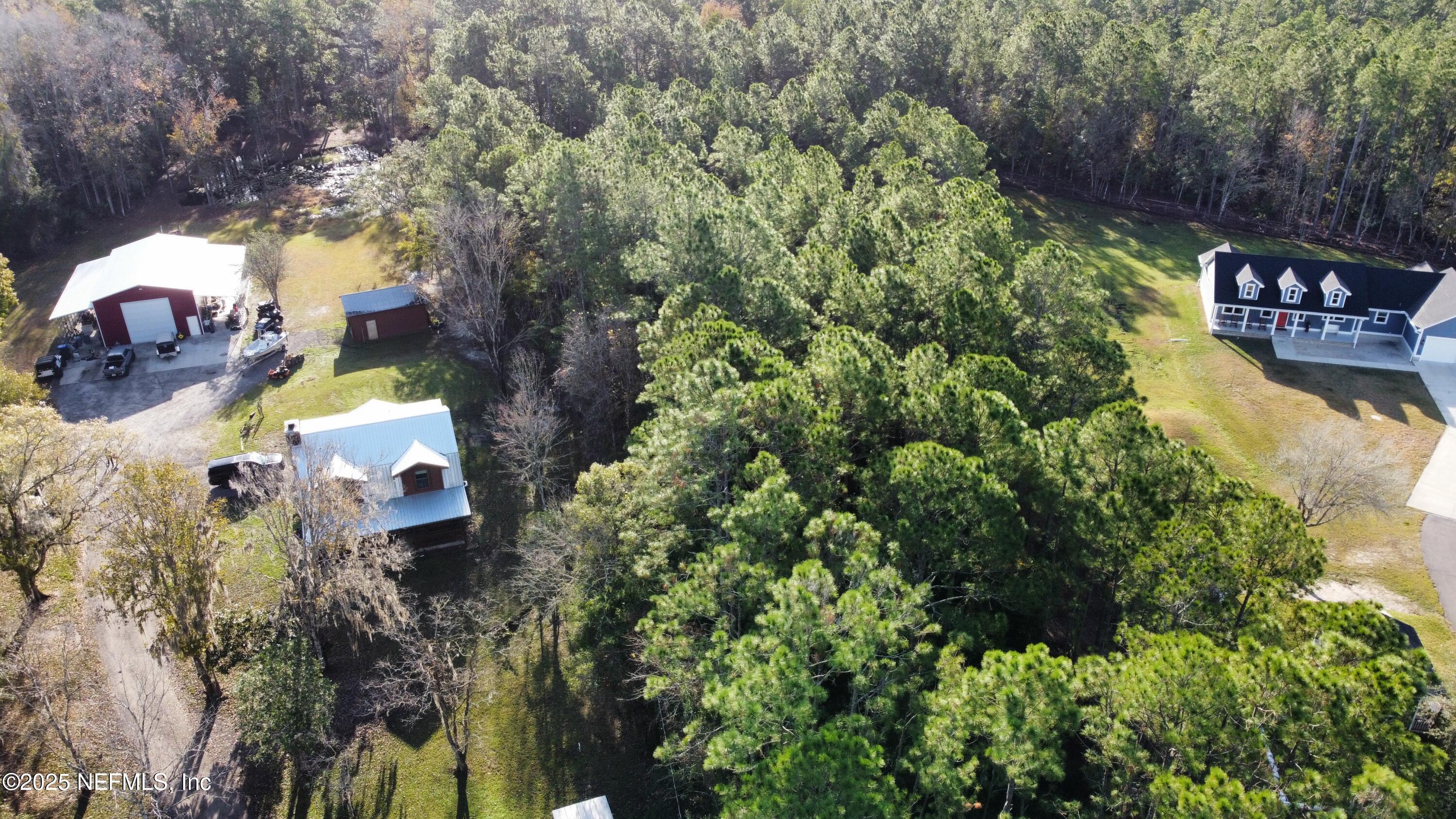 282 Circle Drive East St. Augustine, FL 32084 - Photo 8 of 8 a view of swimming pool with a yard
