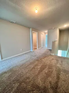 a view of a big room with a fireplace