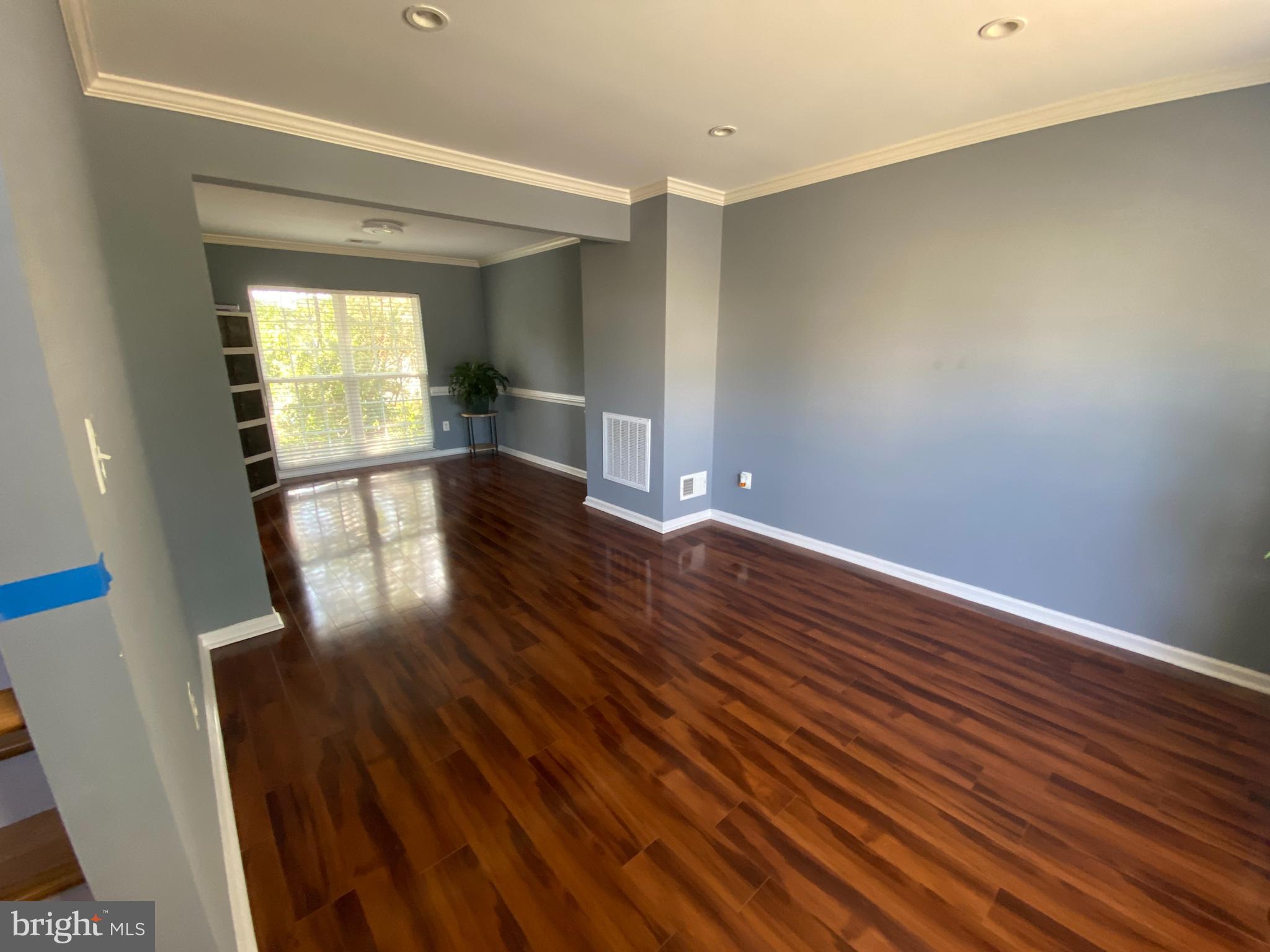 3108 Butterfly Way Dumfries, VA 22026 - Photo 7 of 8 a view of empty room with wooden floor and fan