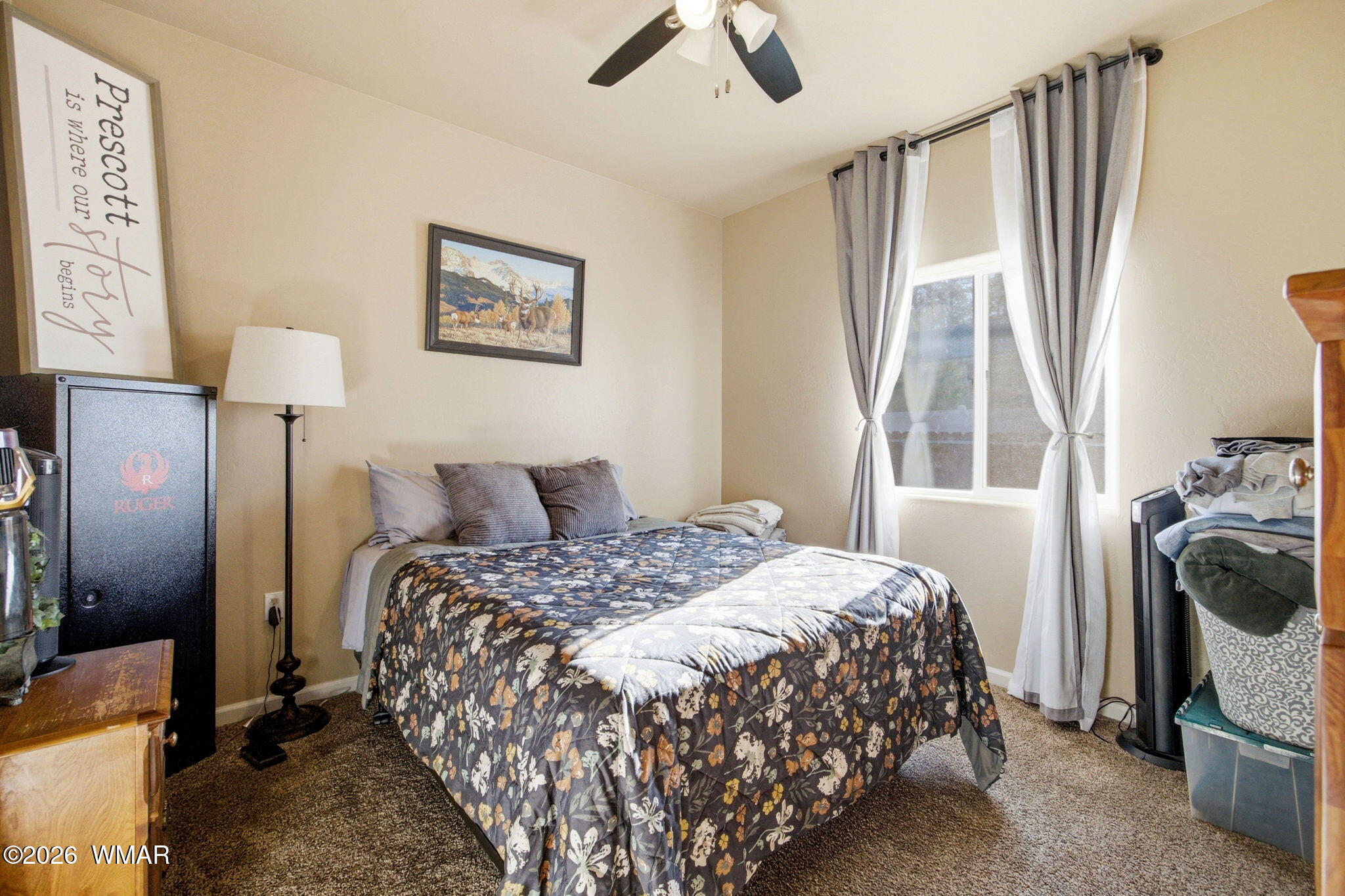 588 Rim Road Pinedale, AZ 85934 - Photo 18 of 30 a bedroom with a bed and a window