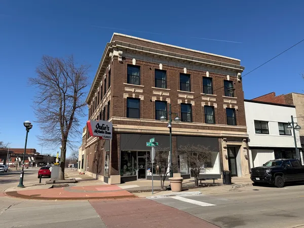 a view of a building with a street