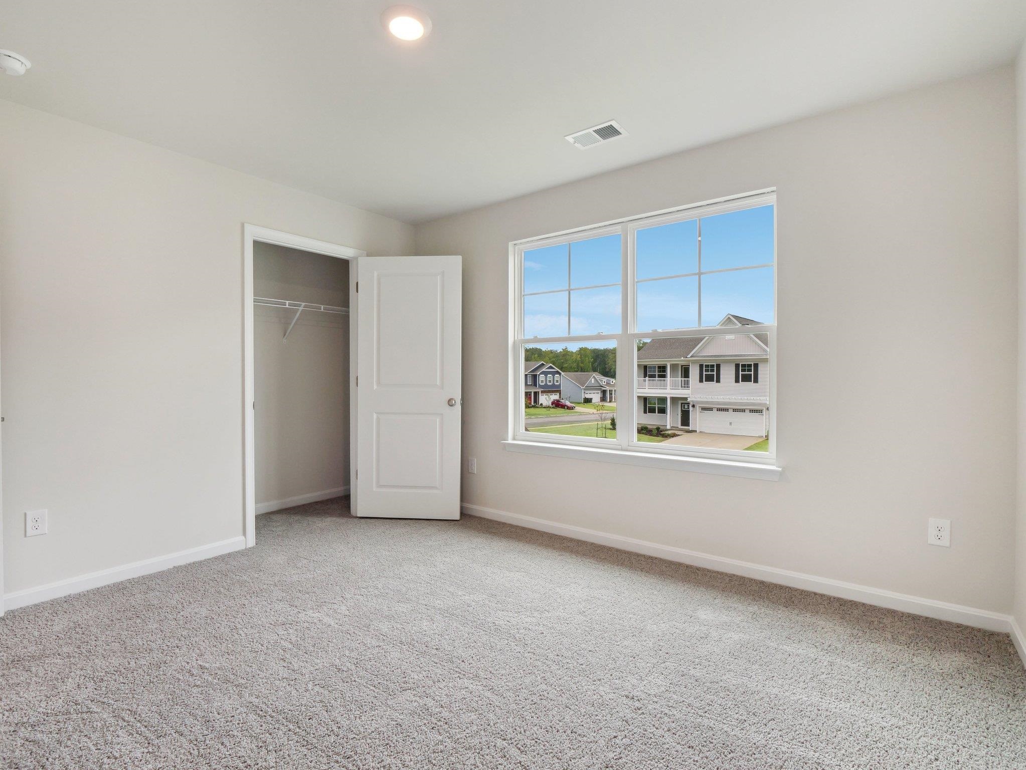 500 Rachel Drive Penn Laird, VA 22846 - Photo 11 of 30 a view of a big room with windows and chandelier fan